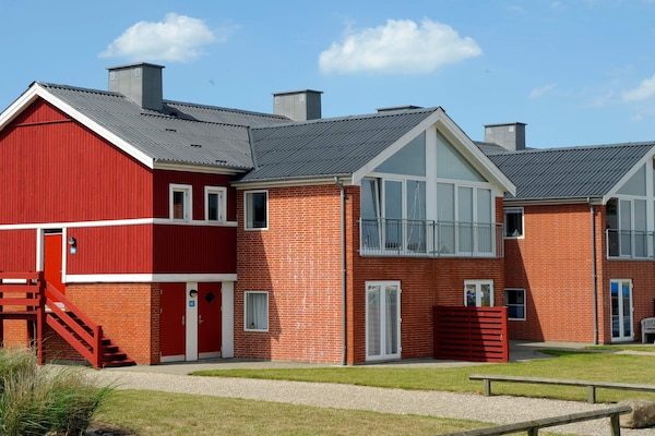 Foto van 4 persoons vakantie huis op een vakantie park in Lemvig - Outdoor