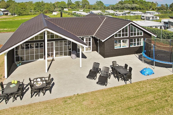 Foto van Luxe strandhuis met zwembad - Vakantiehuis in Odder - Outdoor