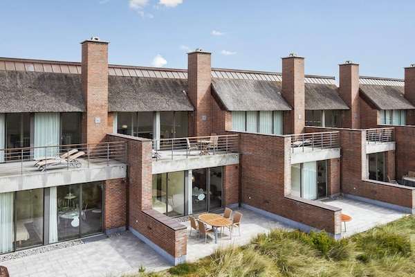 Foto van 4 persoons vakantie huis op een vakantie park in Rømø - Outdoor