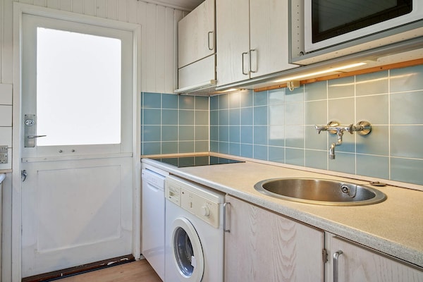 Foto van Een zonnig toevluchtsoord aan het strand - Vakantiehuis in Aakirkeby - Indoor