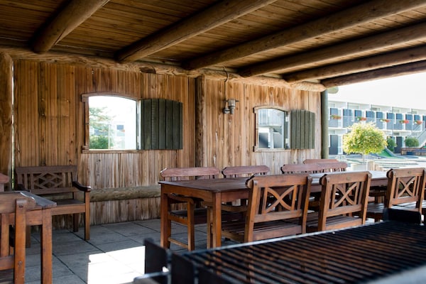 Foto van 4 persoons vakantie huis op een vakantie park in Glesborg - Outdoor