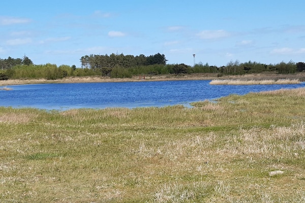 Foto van Privéparkeergelegenheid bij Vanggardsvej - Vakantiehuis in Otterup - WaterView