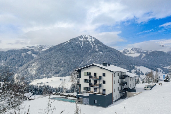Foto van Apartment met infinity pool - Vakantiehuis in St. Martin am Tennengebirge - ExteriorWinter