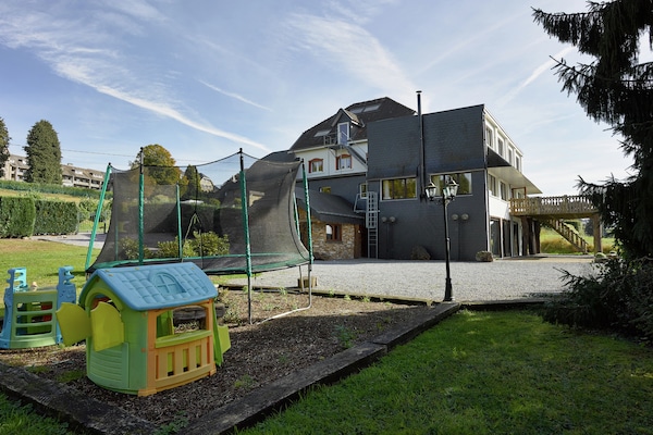 Foto van Imposant vakantiehuis in Stoumont met binnenzwembad en sauna - GardenSummer
