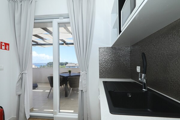 Foto van Appartement op Ugljan met strand en zwembad - Vakantiehuis in Preko - Indoor