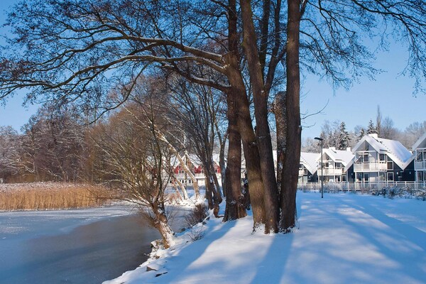 Foto van Rijtjeshuizen in het kasteelpark Bad Saarow - Vakantiehuis in Bad Saarow - AreaWinter1KM