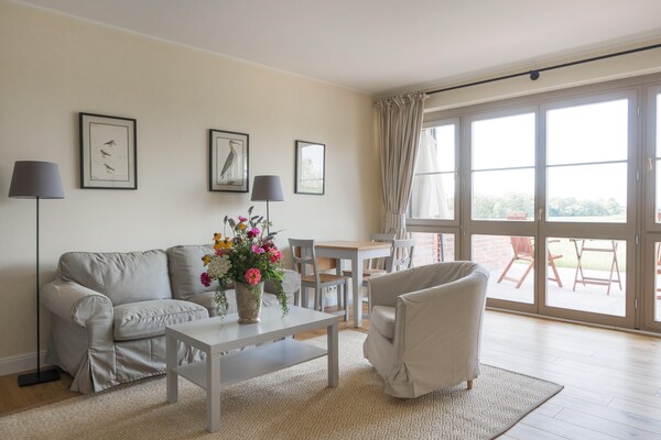 Foto van Vakantieappartement met open haard in Gut Ulrichshusen - LivingRoom