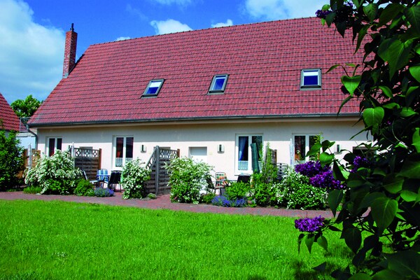 Foto van Rustige rijtjeswoning met wifi in Buchholz am Müritzsee - ExteriorSummer