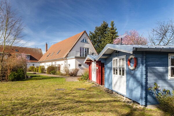 Foto van Rustige rijtjeswoning met wifi in Buchholz am Müritzsee - ExteriorSummer