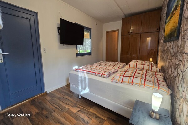Foto van Bungalow in Schlowe aan het zie - Vakantiehuis in Borkow OT Schlowe - BedRoom