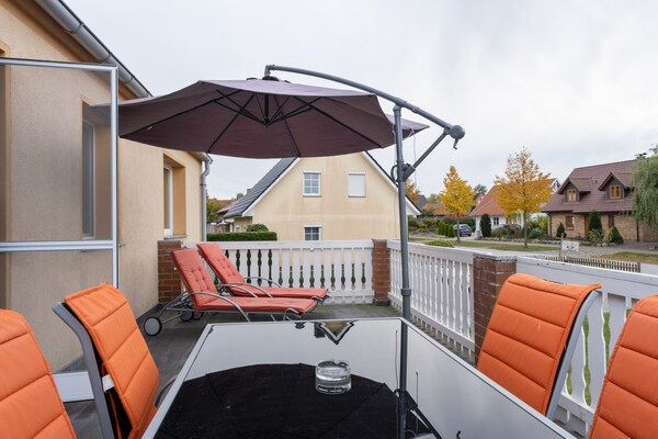 Foto van Gezellige kustvakantie met tuin - Vakantiehuis in Kalkhorst / OT Groß Schwansee - TerraceBalcony