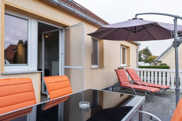 Foto van Gezellige kustvakantie met tuin - Vakantiehuis in Kalkhorst / OT Groß Schwansee - TerraceBalcony