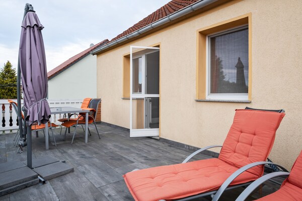 Foto van Gezellige kustvakantie met tuin - Vakantiehuis in Kalkhorst / OT Groß Schwansee - TerraceBalcony