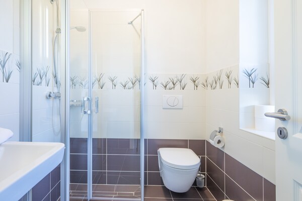 Foto van Exclusief ingerichte vakantiewoning vlakbij het strand - BathRoom