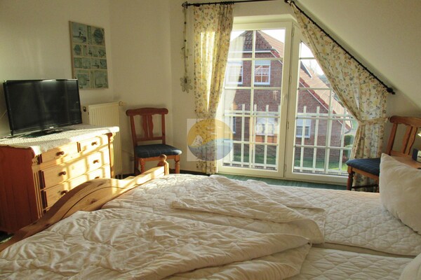 Foto van Chique twee-onder-een-kapwoning in Neßmersiel - Vakantiehuis in Neßmersiel - BedRoom