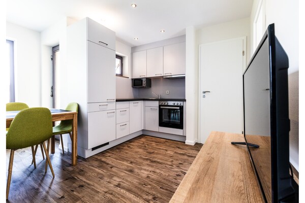 Foto van Bungalow im Campingpark - Vakantiehuis in Waxweiler - Kitchen