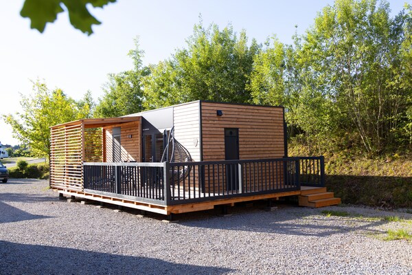 Foto van Chalet met privésauna op Vital Camp Bayerbach - Vakantiehuis in Bayerbach - ExteriorSummer