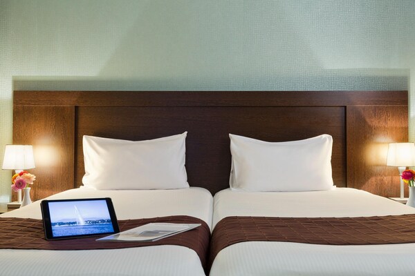 Foto van Appartement met uitzicht op zwembad - Vakantiehuis in Ferney-Voltaire - BedRoom