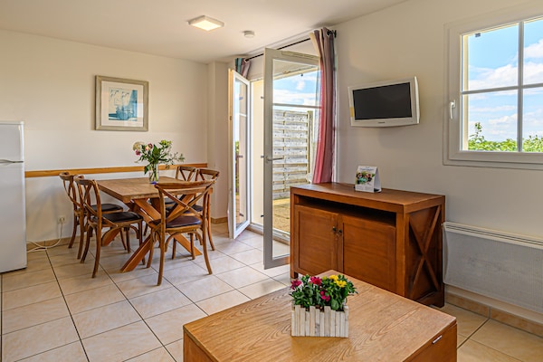 Foto van Bretagne Flat, strand en zwembad - Vakantiehuis in St Nic - DiningRoom