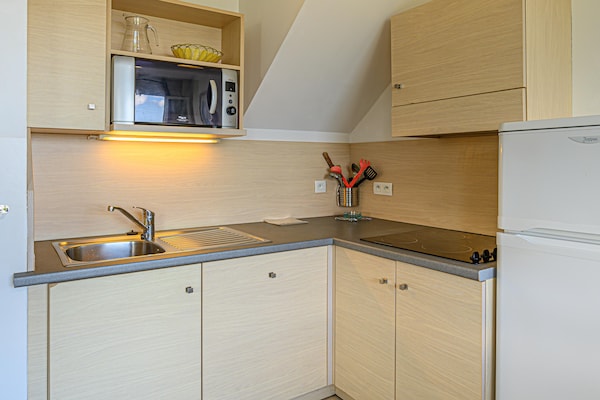 Foto van Bretagne Flat, strand en zwembad - Vakantiehuis in St Nic - Kitchen