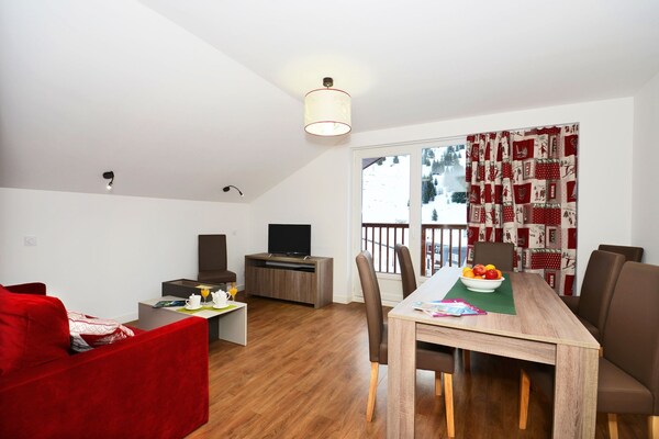 Foto van Chalet in Auris-en-Oisans met Balkonuitzicht - Vakantiehuis in Auris - LivingRoom