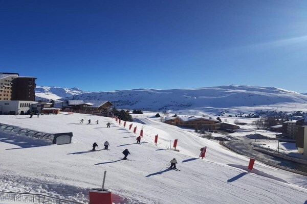 Foto van Familiechalet met open haard - Vakantiehuis in Huez - AreaWinter20KM