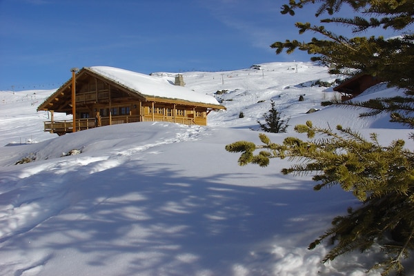 Foto van Familiechalet met open haard - Vakantiehuis in Huez - ExteriorWinter