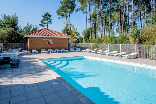 Foto van Bosverblijf voor 4 personen aan het meer - Vakantiehuis in Parentis-en-Born - PoolOfHouse