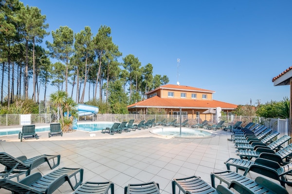 Foto van Bosverblijf voor 4 personen aan het meer - Vakantiehuis in Parentis-en-Born - PoolOfHouse