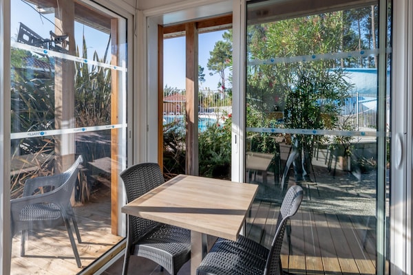 Foto van Bosverblijf voor 4 personen aan het meer - Vakantiehuis in Parentis-en-Born - TerraceBalcony