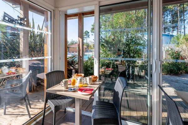 Foto van Bosverblijf voor 4 personen aan het meer - Vakantiehuis in Parentis-en-Born - TerraceBalcony