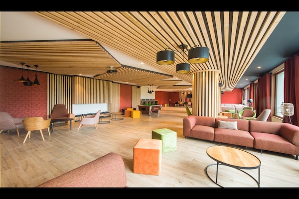 Foto van Appartement in Le Corbier met Spa & Zwembad - Vakantiehuis in Villarembert - LivingRoom