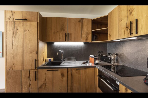 Foto van Appartement in Samoëns met Spa en Zwembad - Vakantiehuis in Samoëns - Kitchen