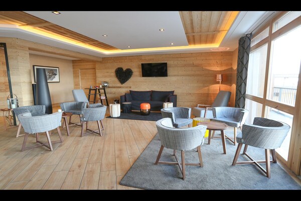 Foto van Appartement in Les Menuires met Spa & Zwembad - Vakantiehuis in St Martin de Belleville - LivingRoom