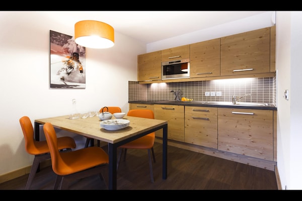 Foto van Appartement in Les Menuires met Spa & Zwembad - Vakantiehuis in St Martin de Belleville - Kitchen