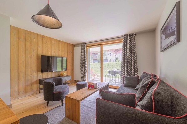 Foto van Chic Alpine Appartement met Gedeeld Zwembad - Vakantiehuis in MEGEVE - LivingRoom