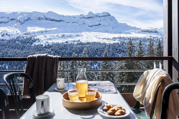 Foto van Berguitzicht vakantiehuis met balkon voor 8 - Vakantiehuis in Flaine - TerraceBalcony