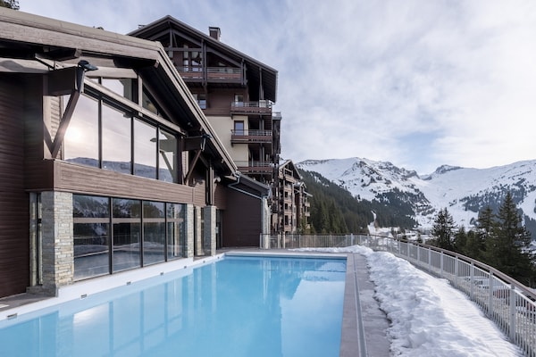 Foto van Berguitzicht vakantiehuis met balkon voor 8 - Vakantiehuis in Flaine - PoolOfHouse