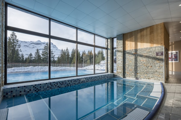 Foto van Berguitzicht vakantiehuis met balkon voor 8 - Vakantiehuis in Flaine - PoolOfHouse