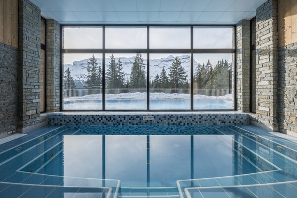 Foto van Berguitzicht vakantiehuis met balkon voor 8 - Vakantiehuis in Flaine - PoolOfHouse