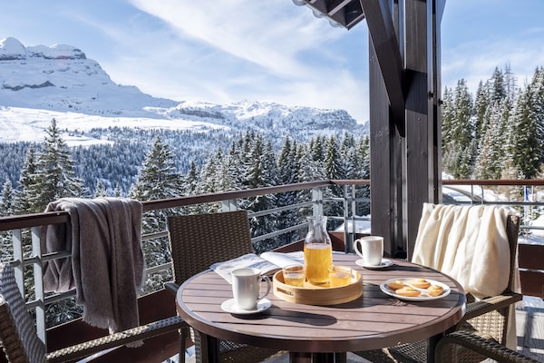 Foto van Berguitzicht vakantiehuis met balkon voor 8 - Vakantiehuis in Flaine - TerraceBalcony