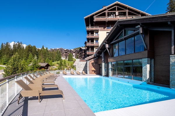 Foto van Berguitzicht vakantiehuis met balkon voor 8 - Vakantiehuis in Flaine - PoolOfHouse