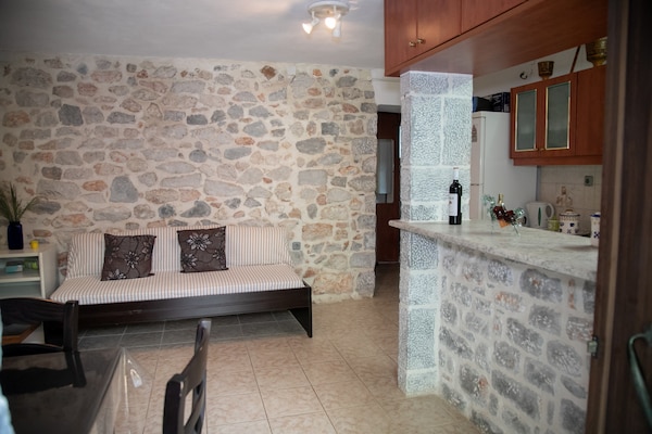 Foto van Huis in Pyrgos Dirou bij Halikia Strand - Vakantiehuis in Pyrgos Dirou - LivingRoom