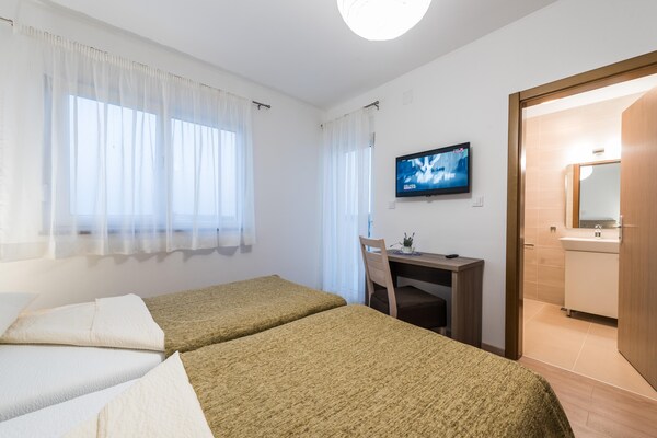 Foto van Appartement in Kroatië bij de Adriatische Zee - Vakantiehuis in Sukosan - BedRoom