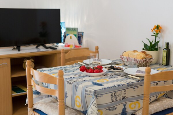 Foto van Chic and Charming Krk Downtown Apartments - Classic Studio Apartment - DiningRoom