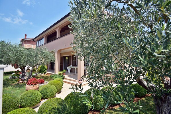 Foto van Appartement in Pula bij Golfbaan - Vakantiehuis in Pula - ExteriorSummer