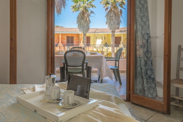 Foto van Residence met gemeenschappelijk zwembad in Palau - Vakantiehuis in Palau (SS) - TerraceBalcony