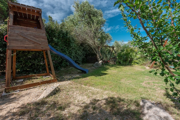 Foto van Residence met gemeenschappelijk zwembad in Palau - Vakantiehuis in Palau (SS) - ExteriorSummer