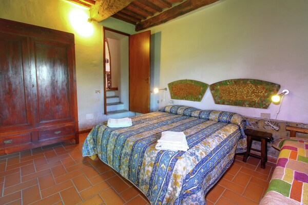 Foto van Glooiende boerderij van Val d'Orcia - Vakantiehuis in Castiglione D'orcia - BedRoom