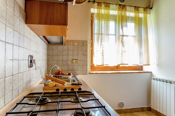 Foto van Romantisch appartement in Umbrië met centrale ligging - Kitchen